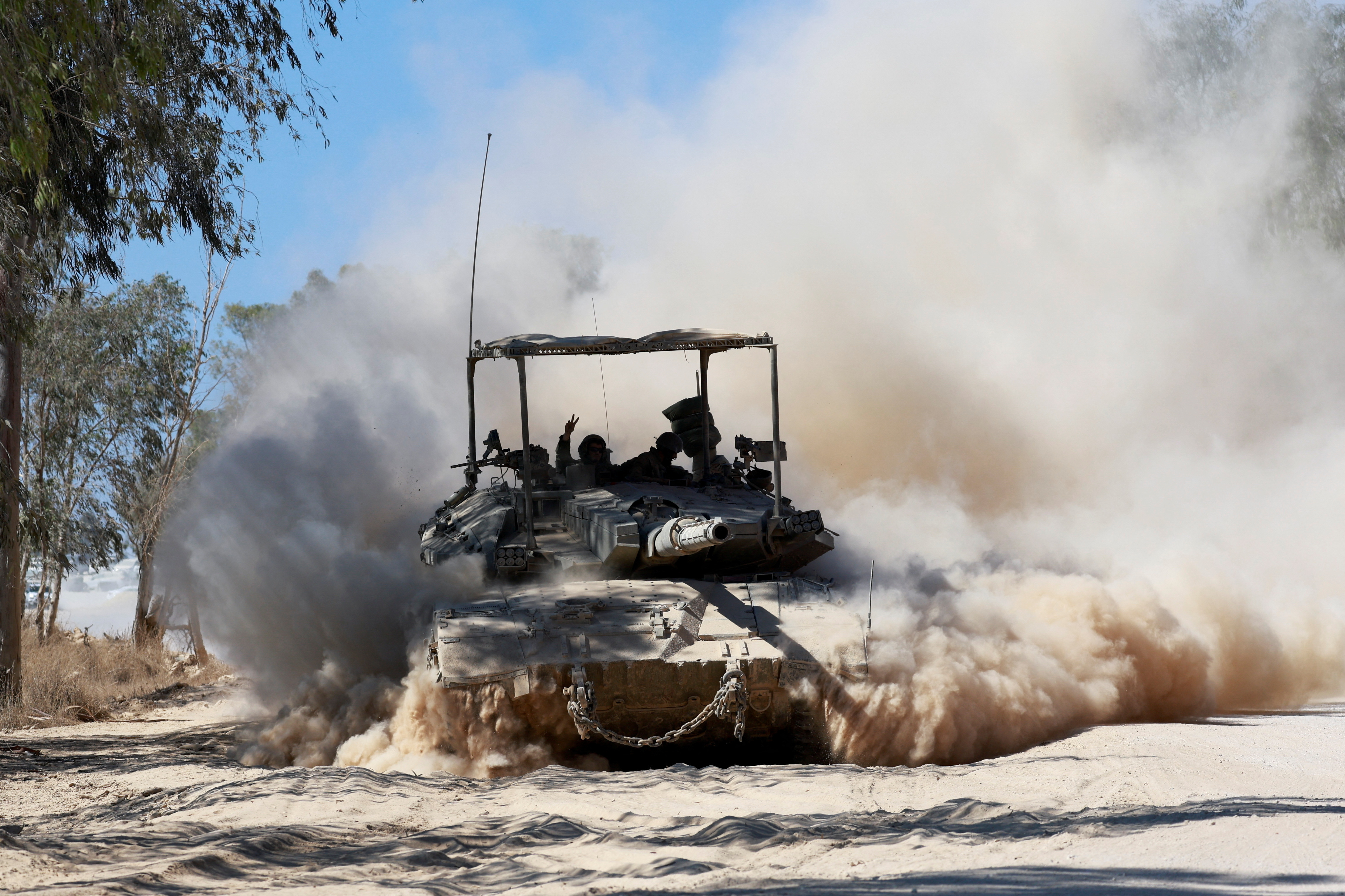 FILE PHOTO: Israeli tank manoeuvres near the Israel-Gaza border