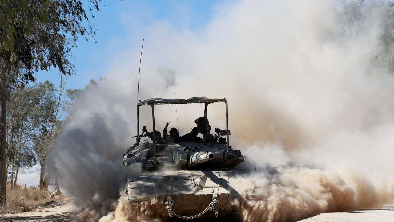 FILE PHOTO: Israeli tank manoeuvres near the Israel-Gaza border