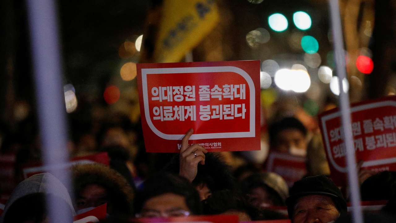 Doctors take part in a protest against a plan to admit more students to medical school, in front of the Presidential Office in Seoul