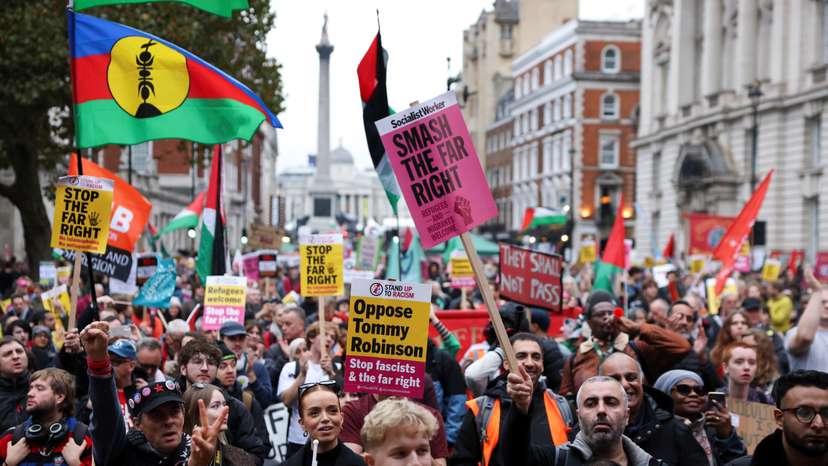 Counter-protesters take part in a demonstration against Tommy Robinson and the far-right, in London