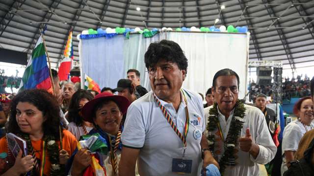 FILE PHOTO: Bolivia’s former President Evo Morales leaves after attending a RUNASUR event