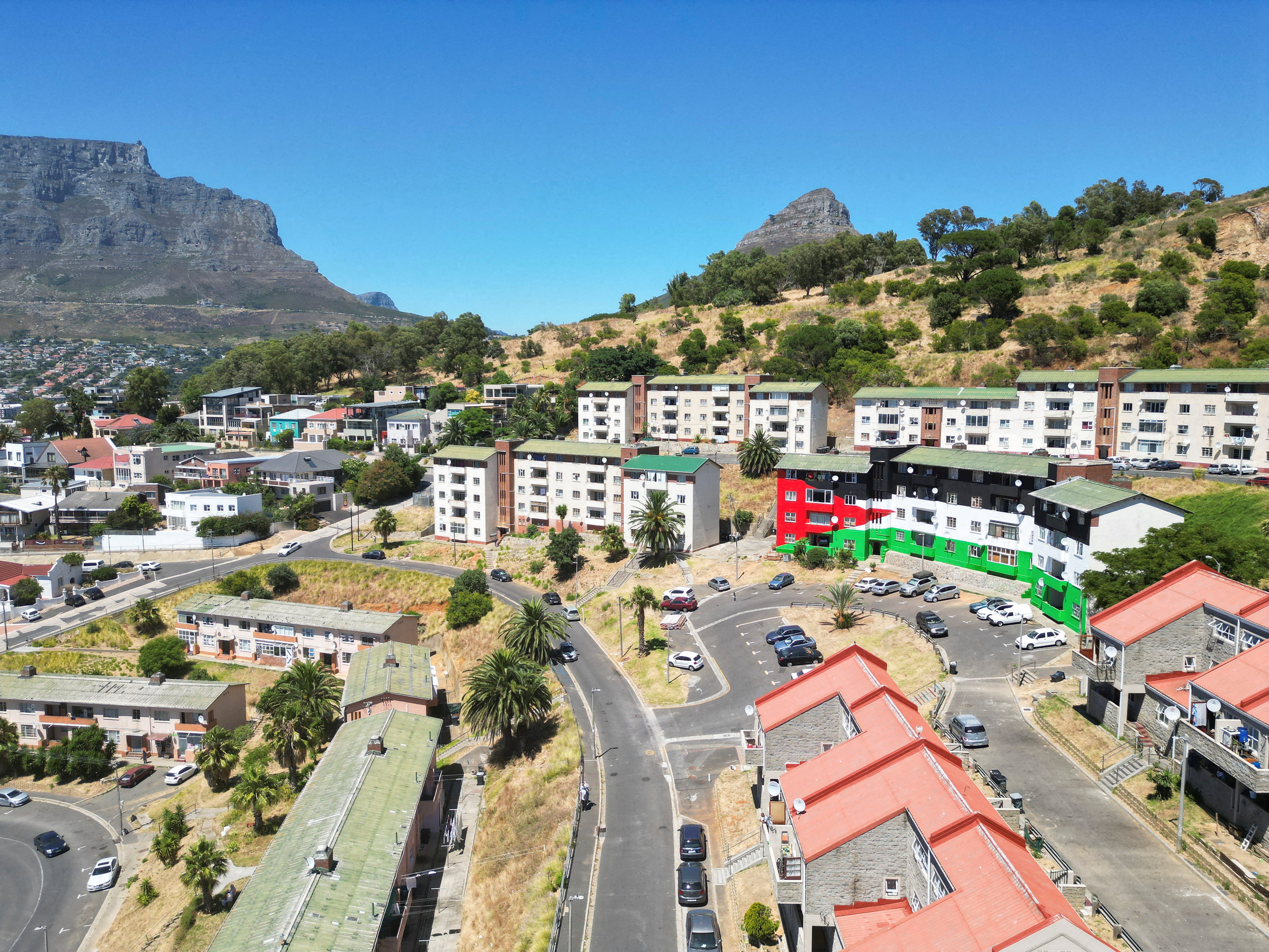FILE PHOTO: Bo-Kaap residents and artists paint the Palestinian flag on a block of flats, in Cape Town