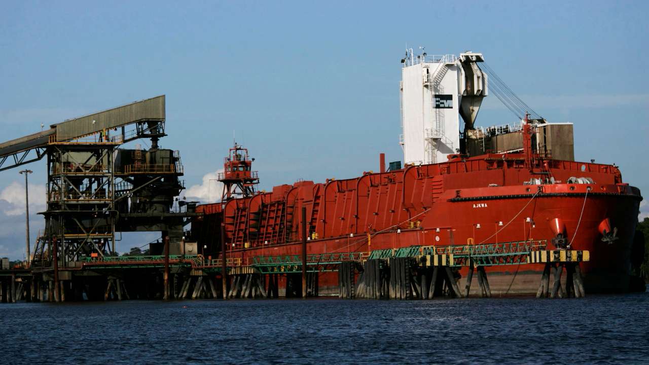 A ship waits at at Amamapare port, which has been void of activity since last Monday's strike, in Timika