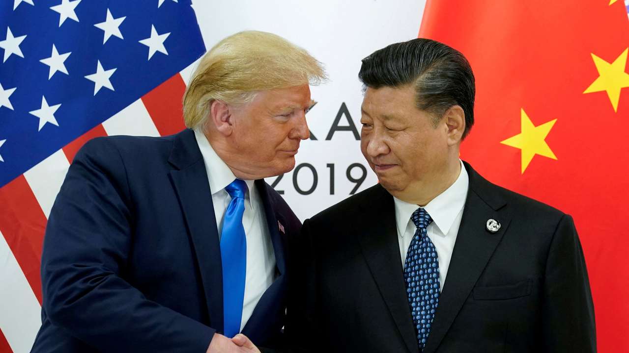 FILE PHOTO: Trump meets Xi at the G20 leaders summit in Osaka, Japan