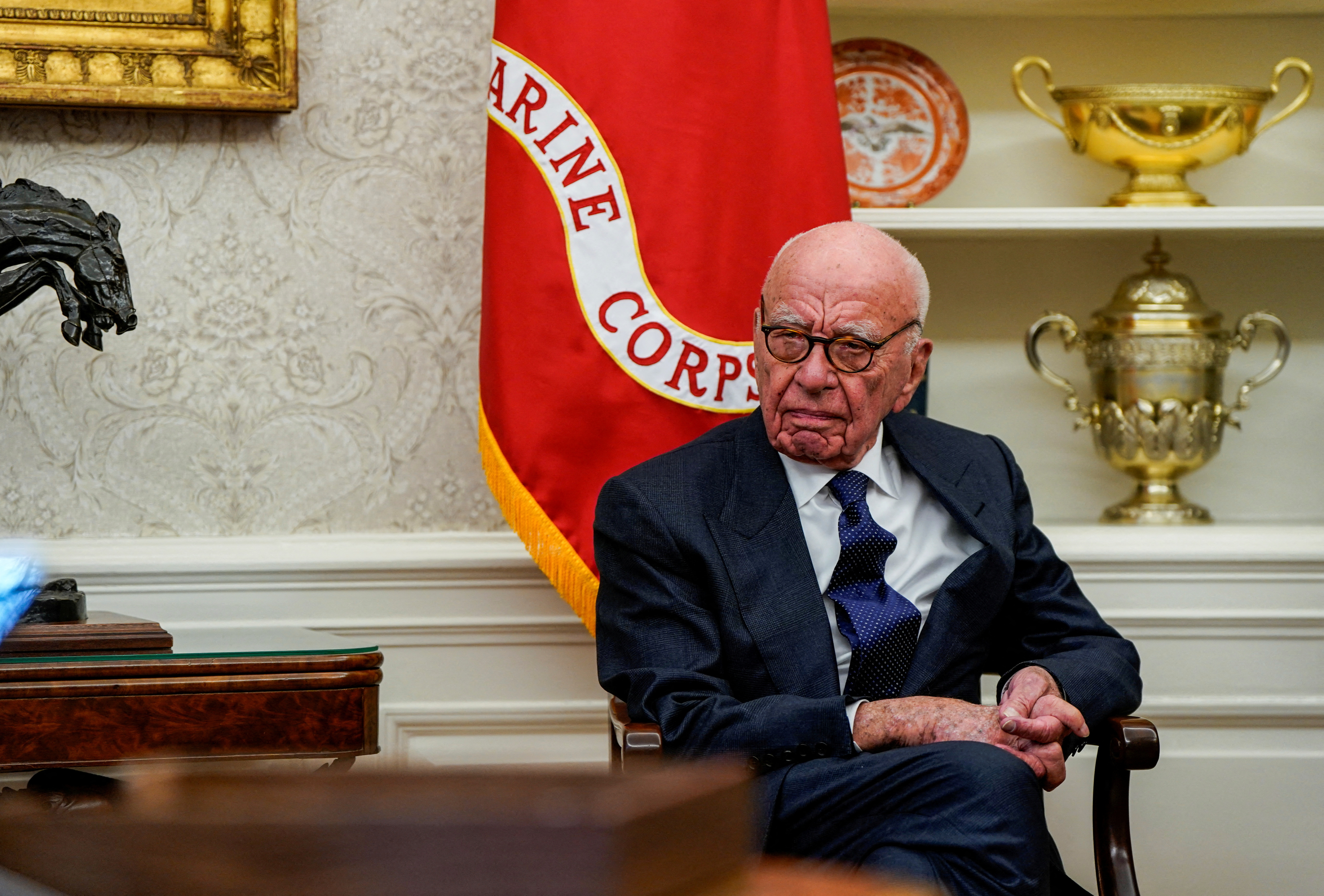 FILE PHOTO: Rupert Murdoch looks on, at the White House