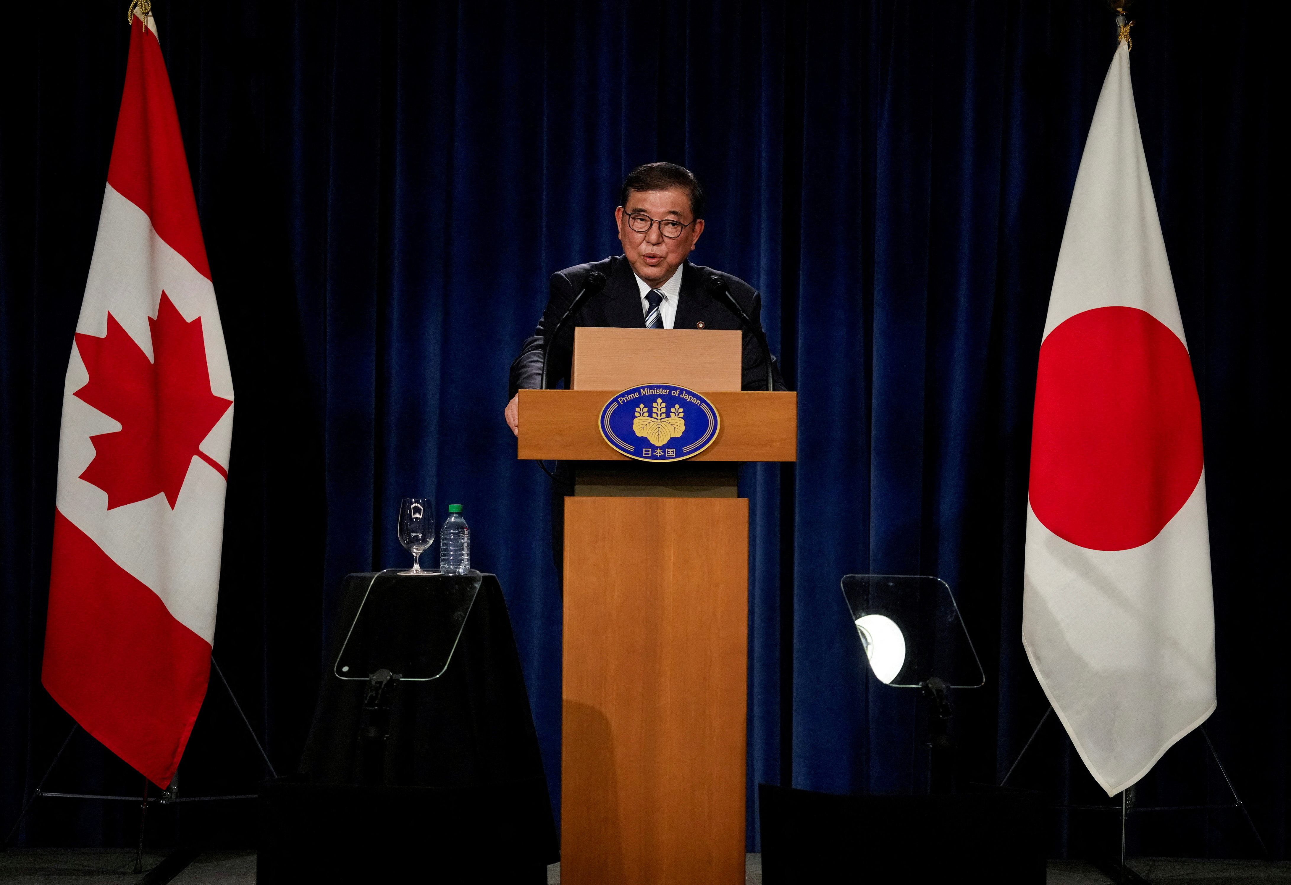 FILE PHOTO: Japanese PM Ishiba holds press conference after G7 Summit, in Calgary