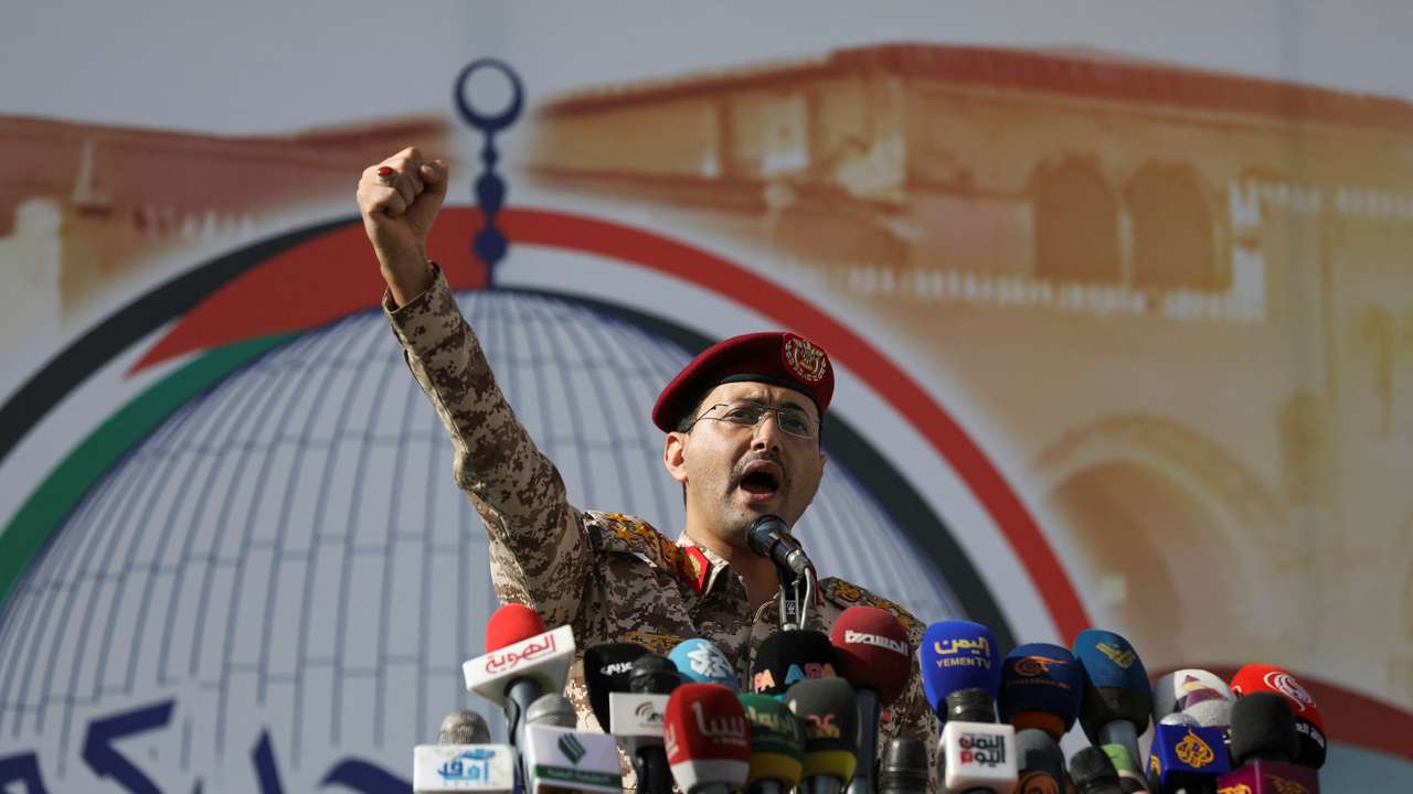 Houthi military spokesman, Yahya Sarea, chants slogans as he delivers a statement during a pro-Palestinian rally in Sanaa