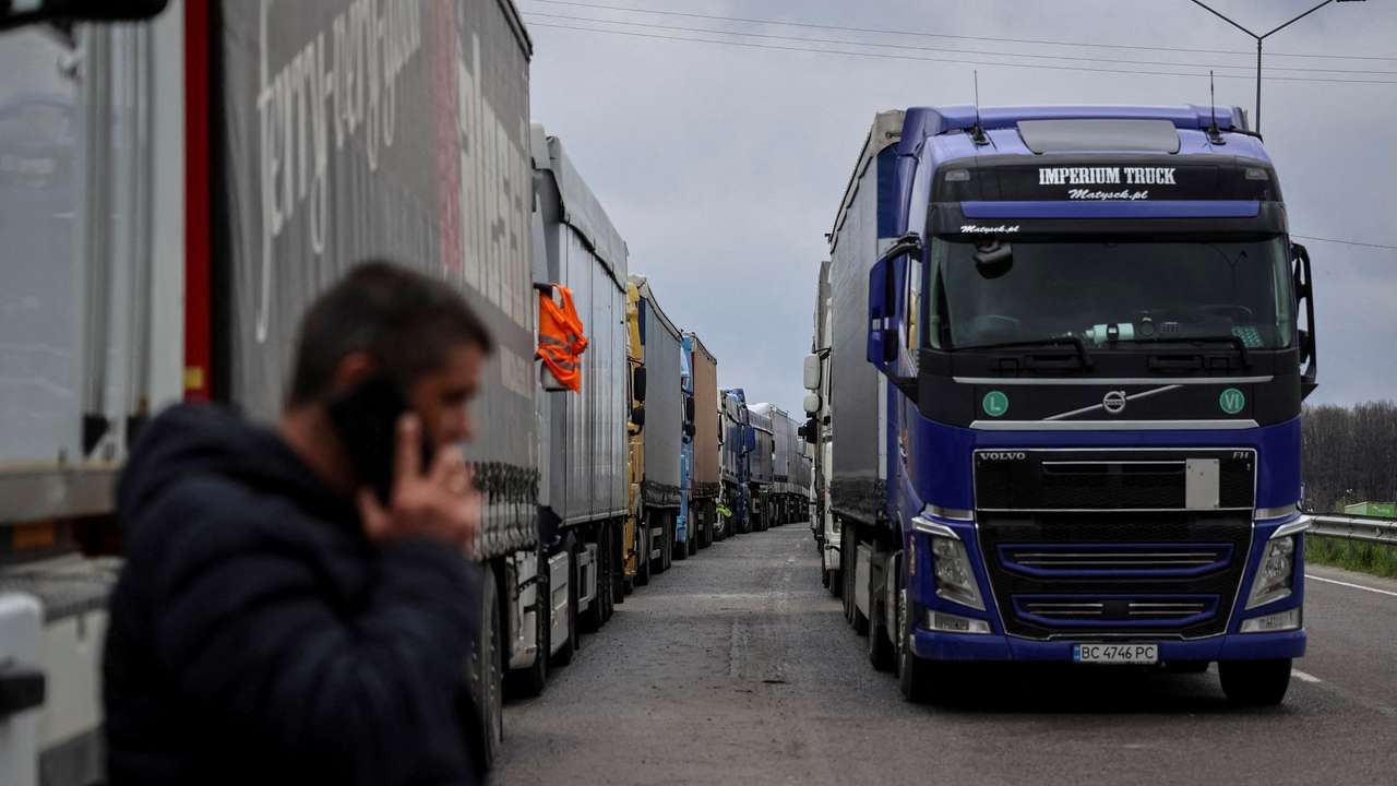 FILE PHOTO: Trucks wait for crossing the Ukraine-Poland border at the checkpoint Rava-Ruska