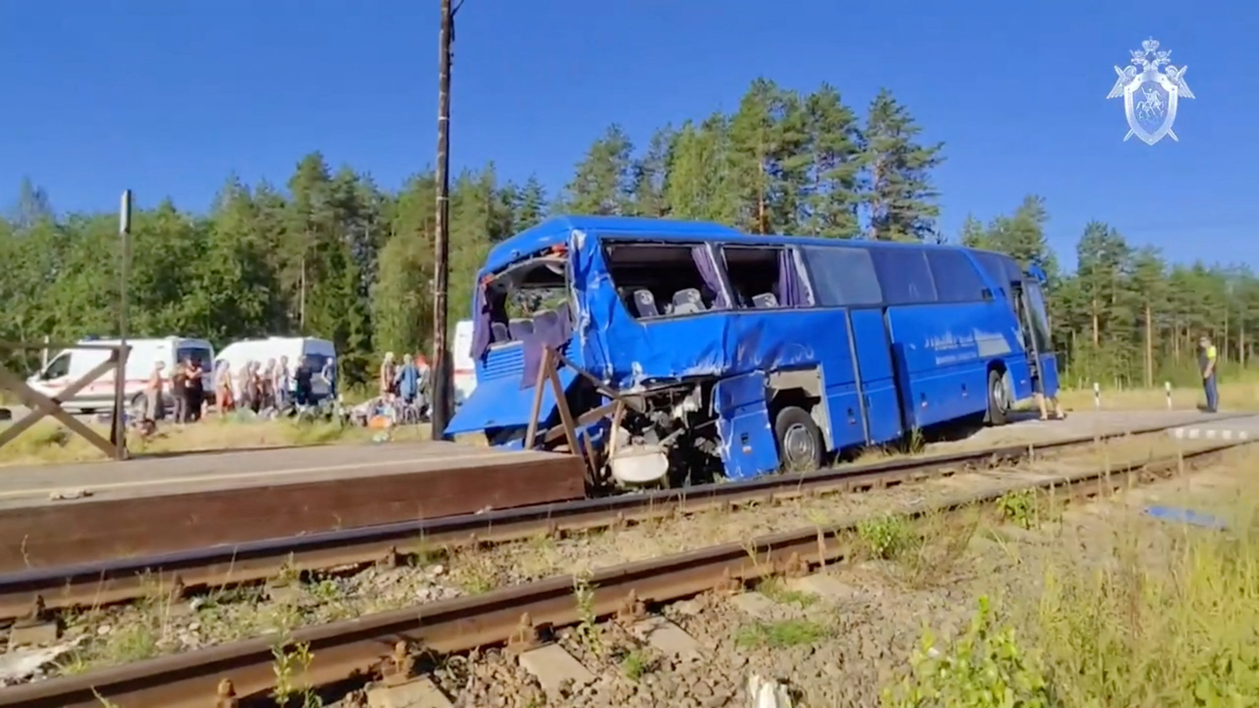 Aftermath of collision of bus with train in Russia's Leningrad region