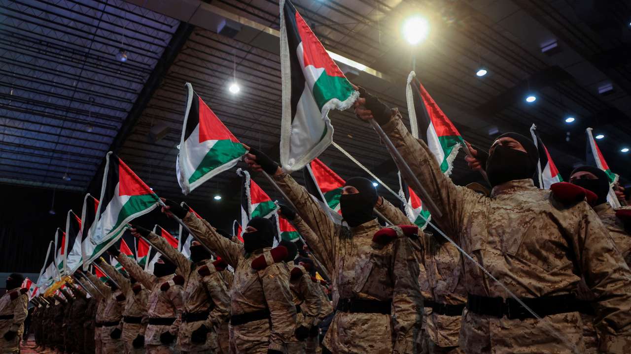 Hezbollah members parade during a rally marking al-Quds Day in Beirut's southern suburbs