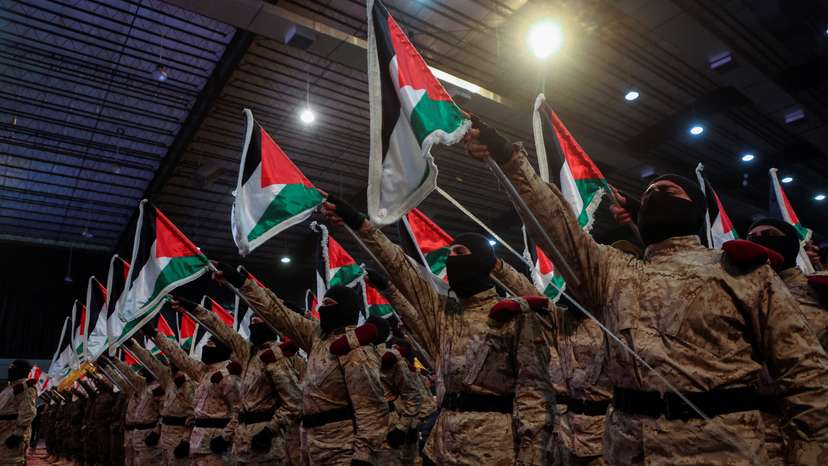 Hezbollah members parade during a rally marking al-Quds Day in Beirut's southern suburbs
