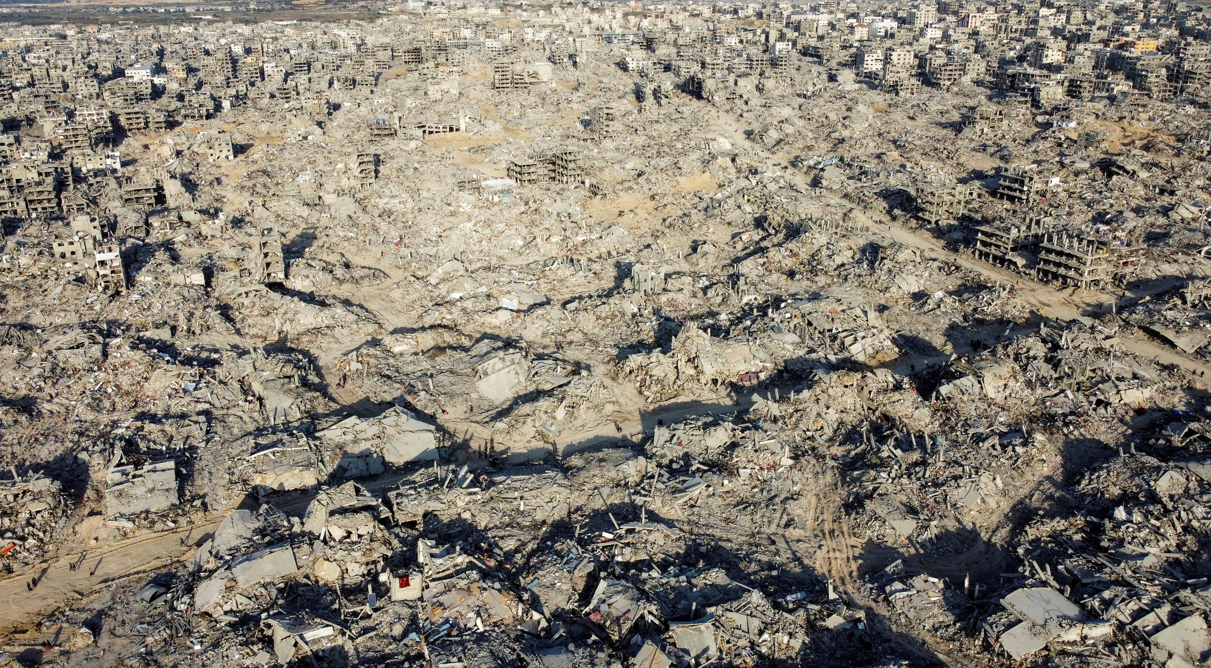 FILE PHOTO: A drone view shows houses and buildings lying in ruins, following a ceasefire between Israel and Hamas, in the northern Gaza Strip