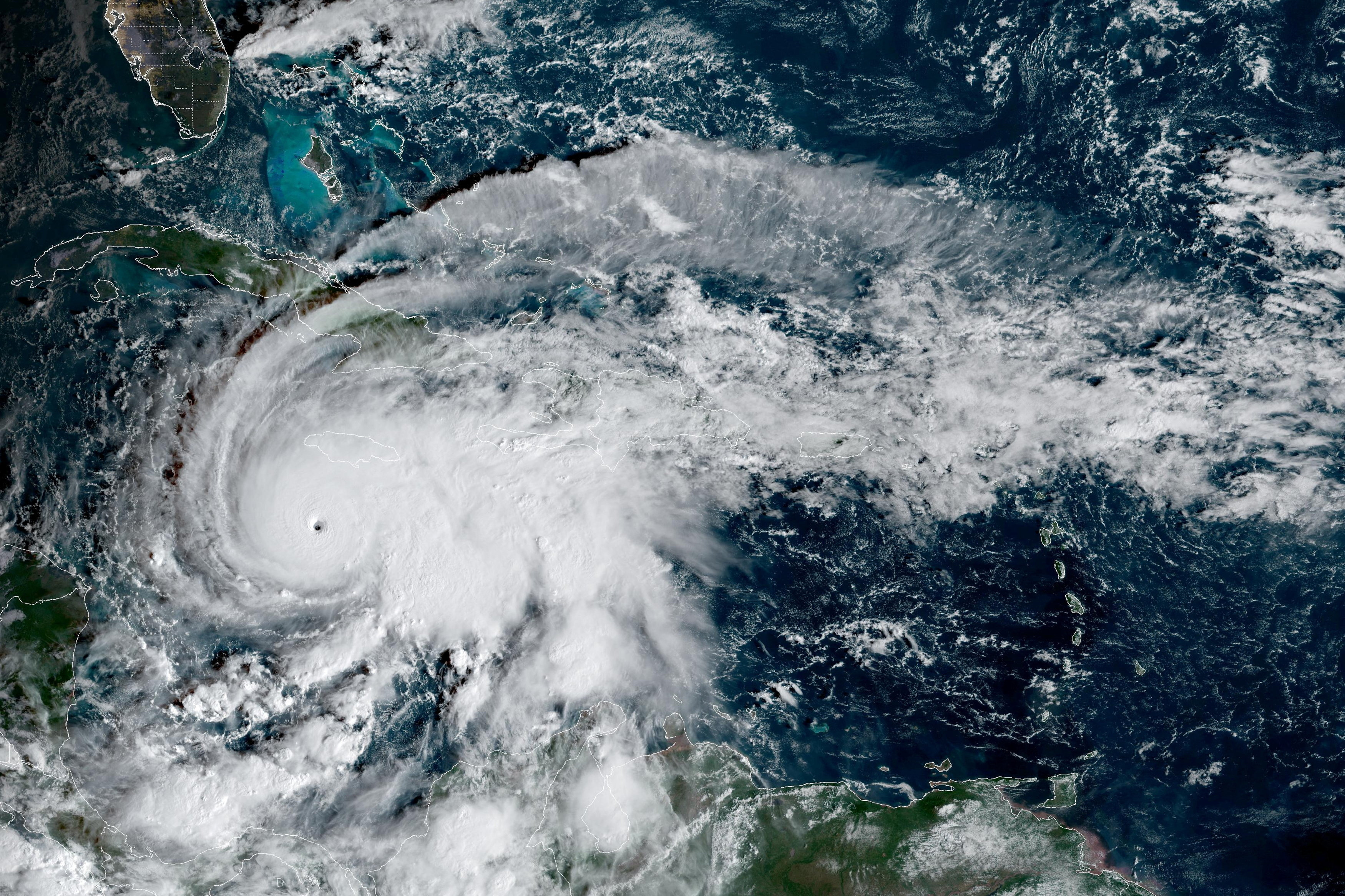 Hurricane Melissa, which has developed into a Category 5 storm, moves north in the Caribbean Sea towards Jamaica and Cuba