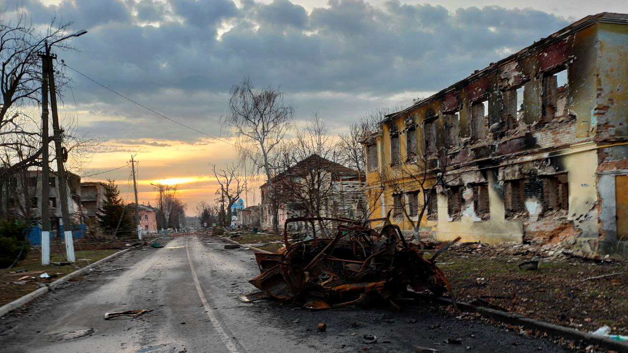A view shows a destroyed vehicle on a street in Sudzha