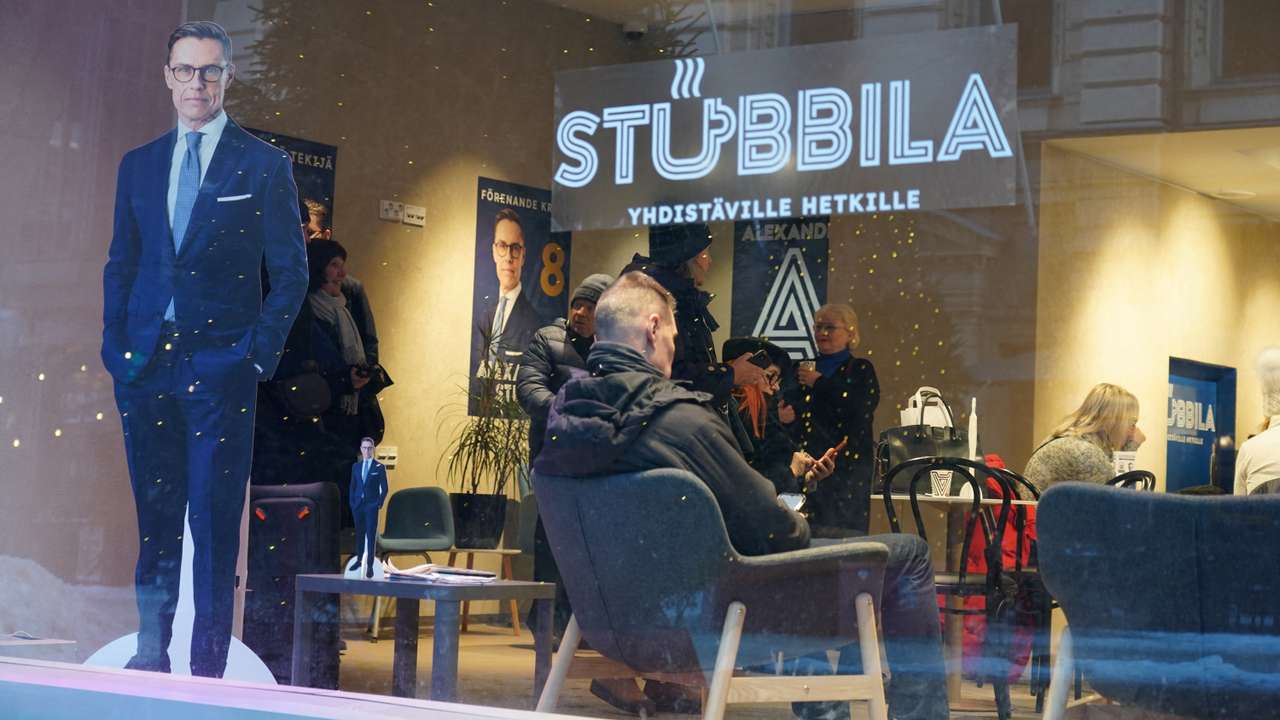A cut-out of National Coalition Party (NCP) Presidential candidate Alexander Stubb is seen in the window of his campaign cafe in Helsinki