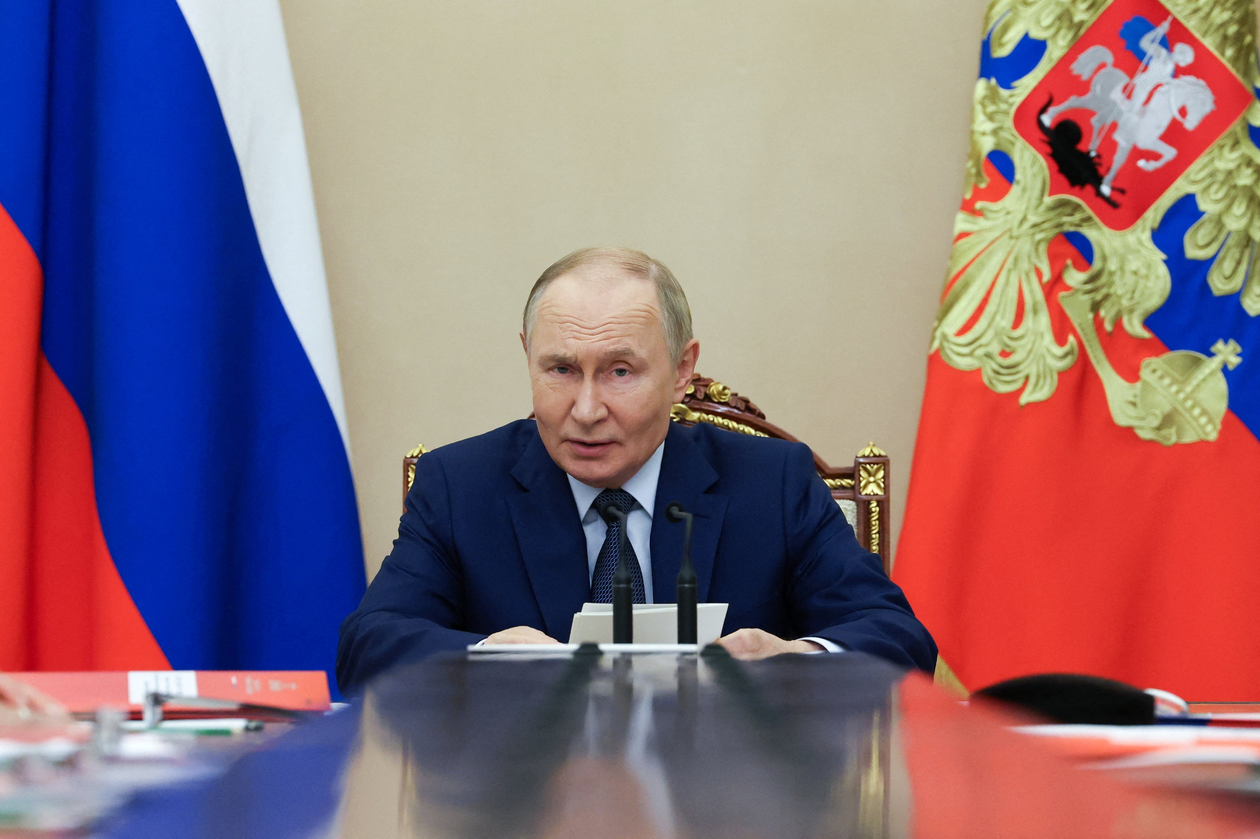 Russian President Putin chairs a meeting with members of the Security Council in Moscow
