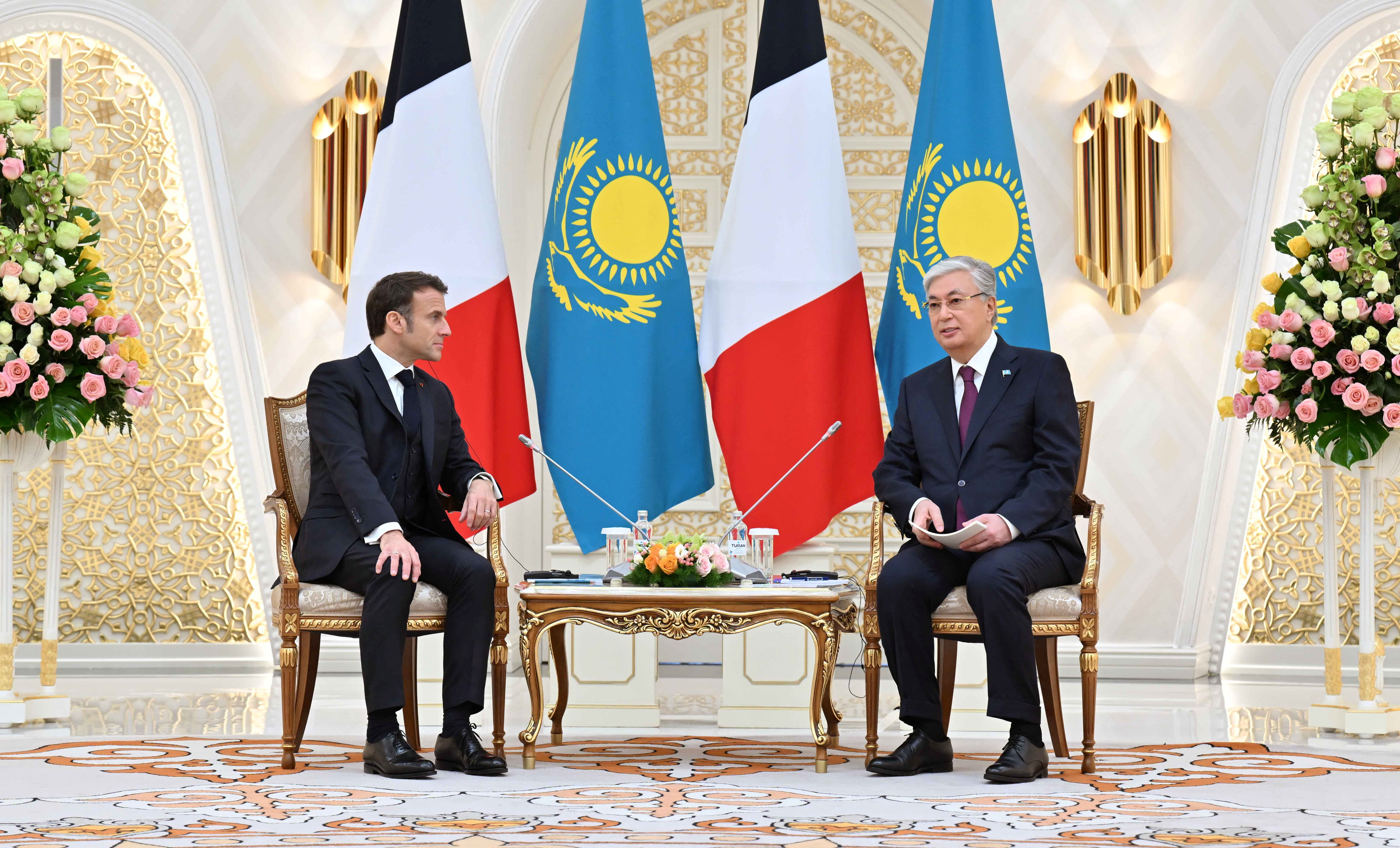 Kazakh President Kassym-Jomart Tokayev meets with French President Emmanuel Macron in Astana