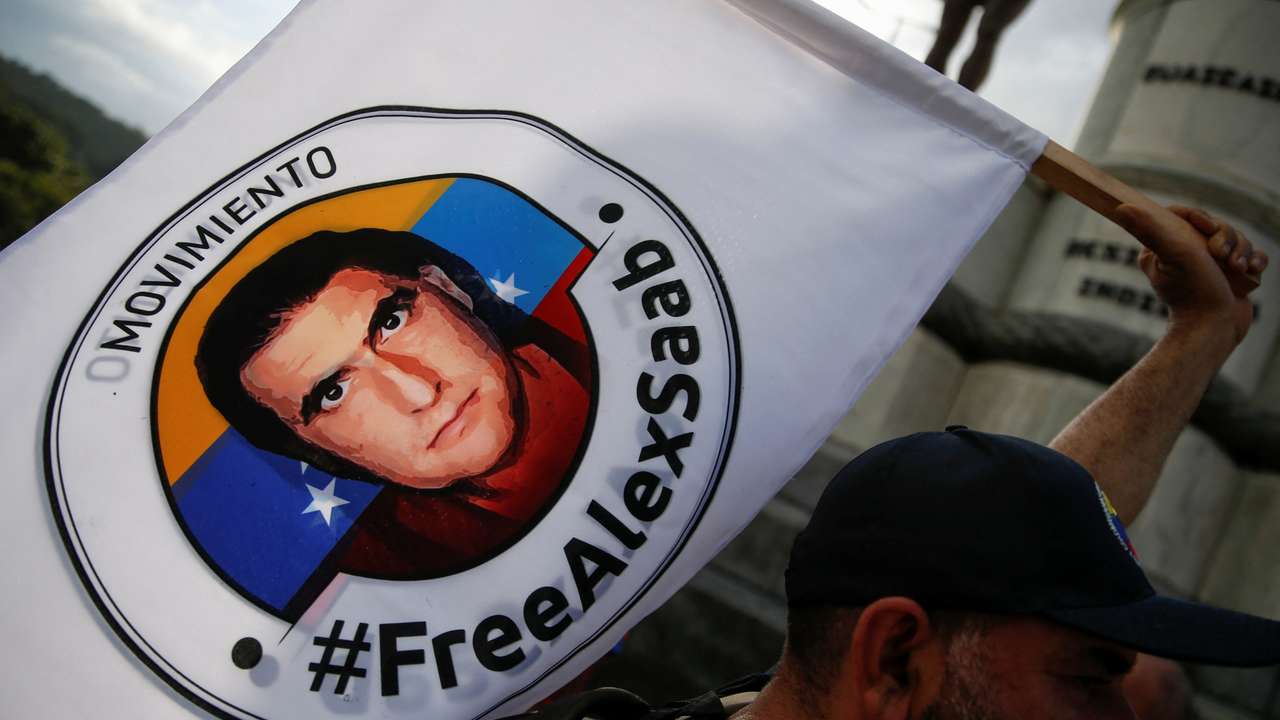 Demonstrators of the "Free Alex Saab" movement participate in a caravan, in Caracas