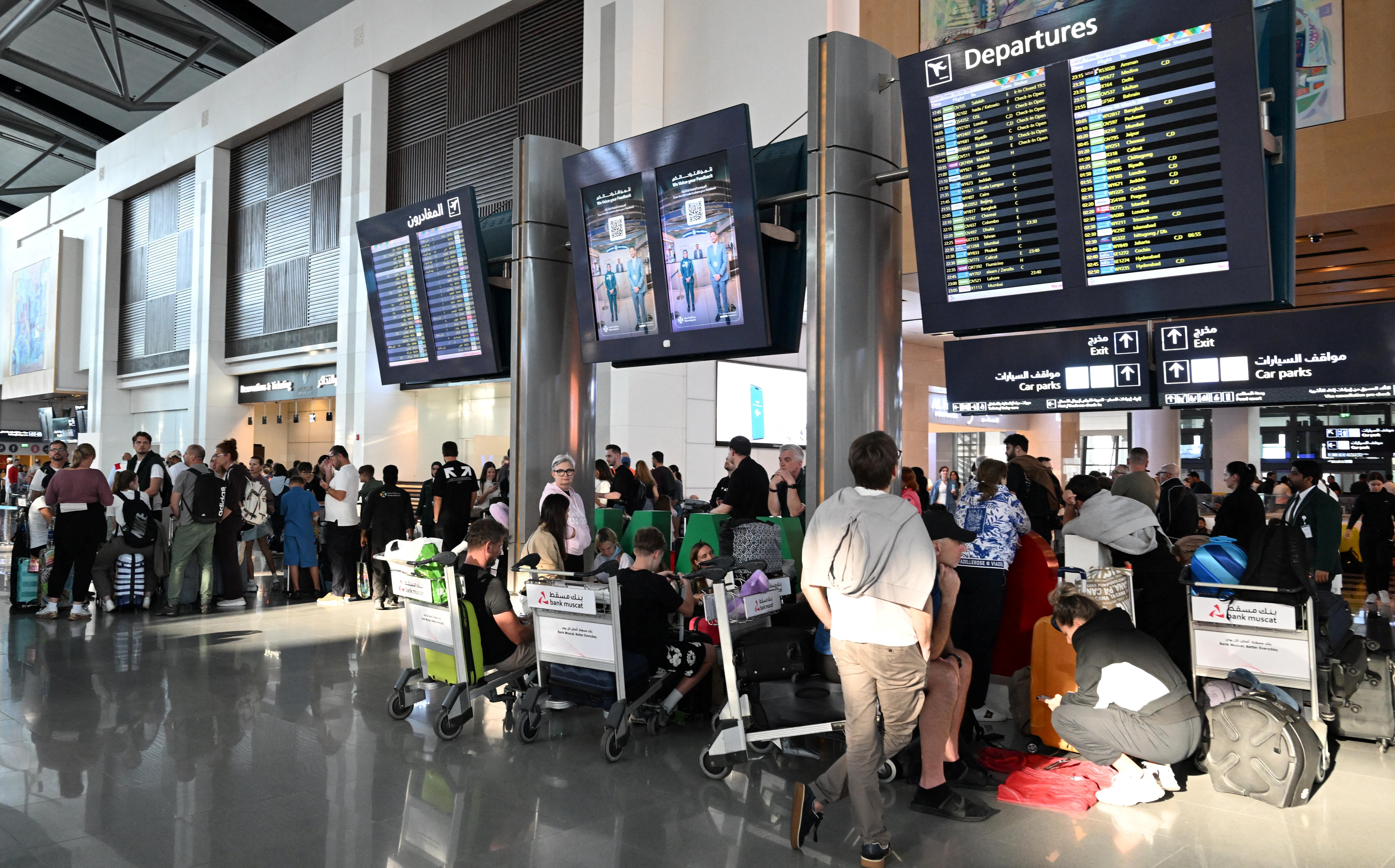 Passengers wait at Muscat International Airport as the Sultanate of Oman facilitates the return of passengers to their home countries
