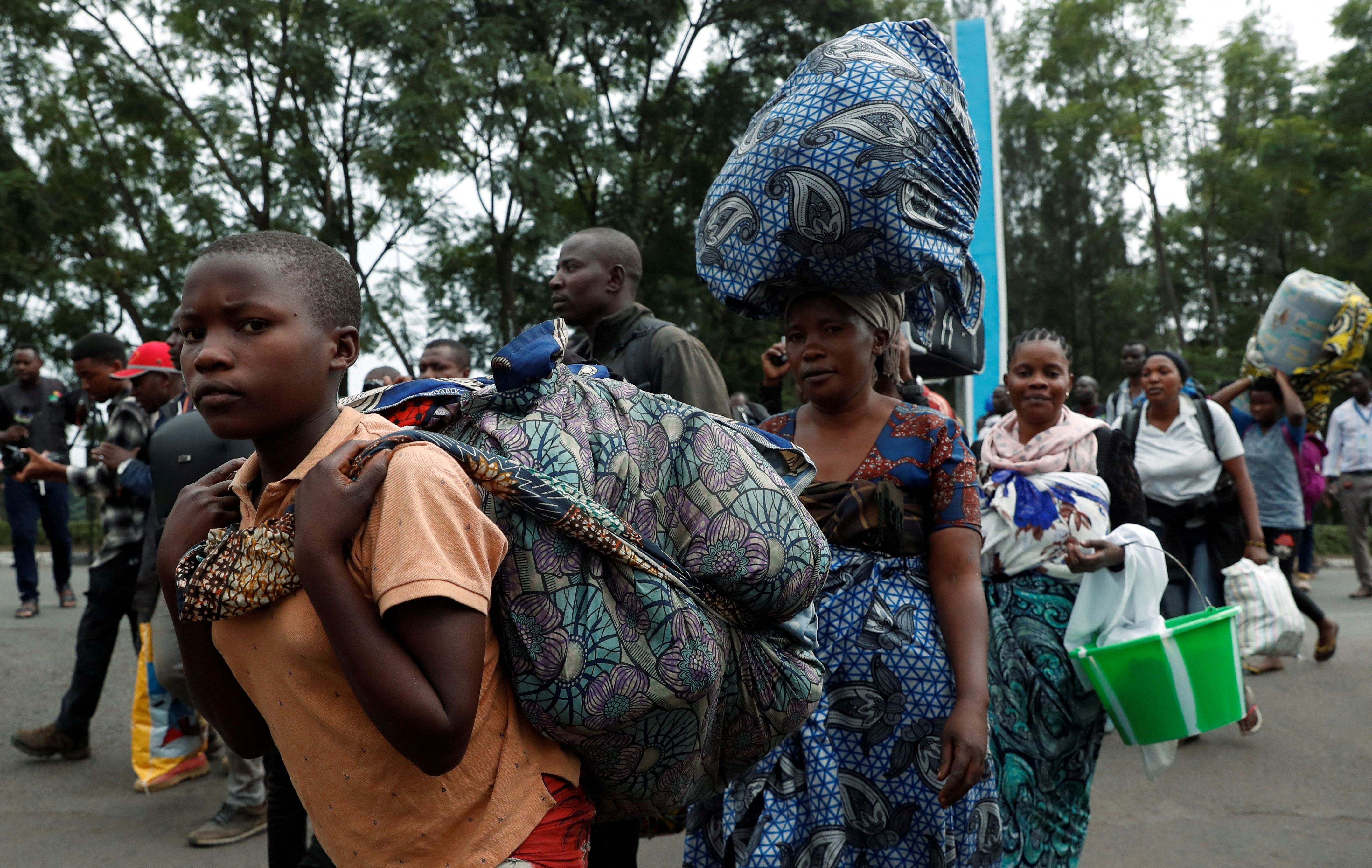FILE PHOTO: People flee eastern Congo into Rwanda as fighting rages in Goma