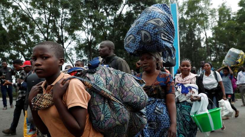 FILE PHOTO: People flee eastern Congo into Rwanda as fighting rages in Goma