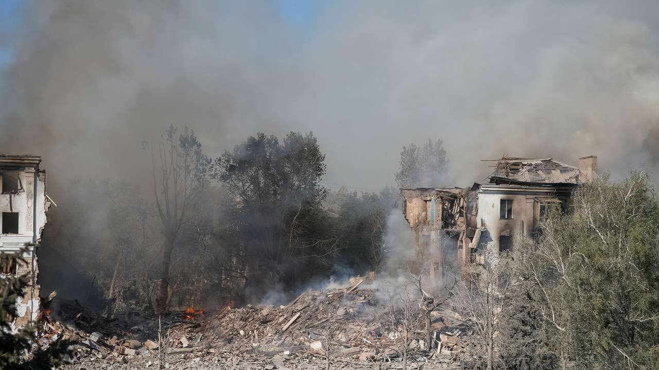 A view shows the site of an apartment building hit by Russian missile strike in the city of Kramatorsk