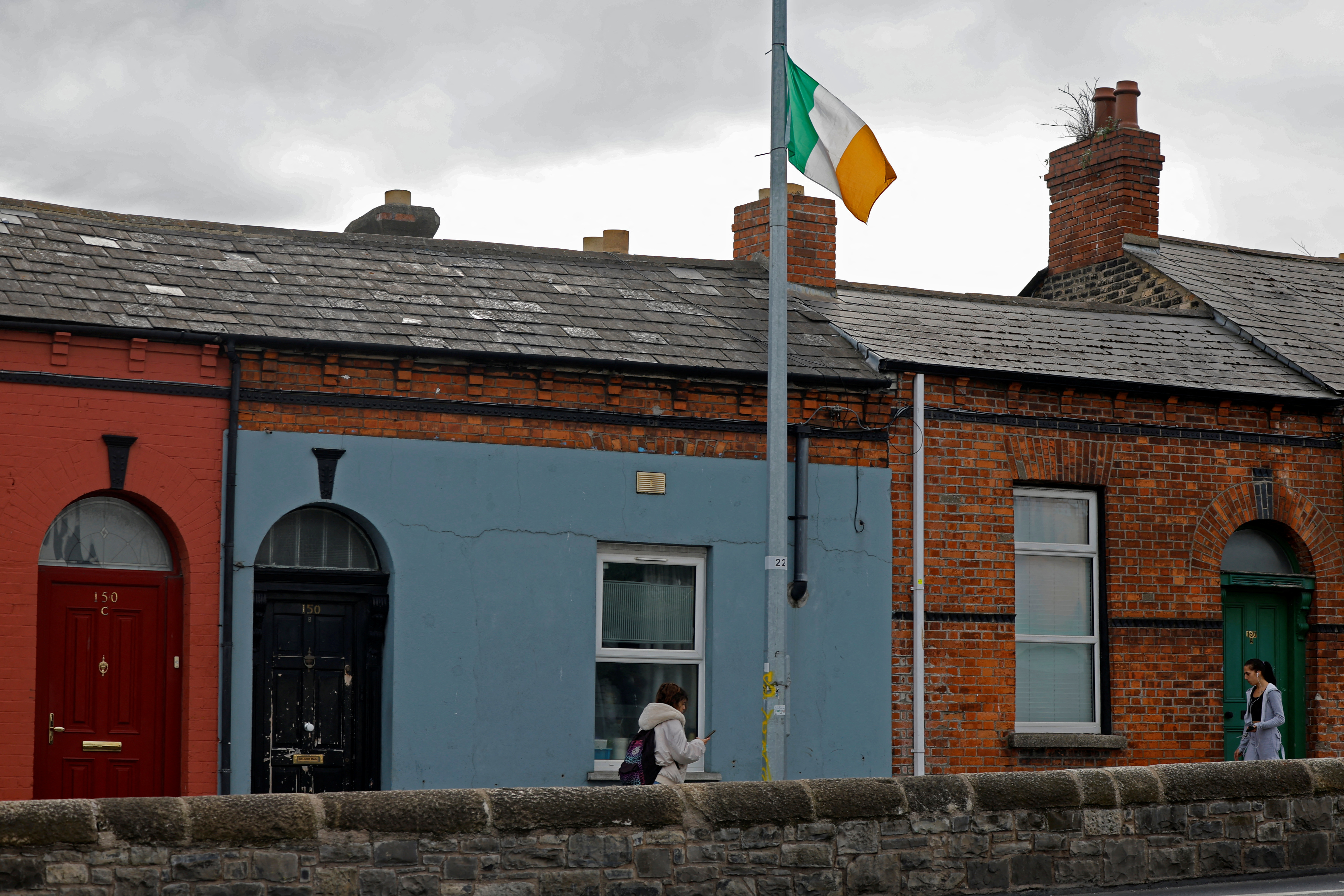 Right-wing activists divide Dublin with lamppost flag blitz