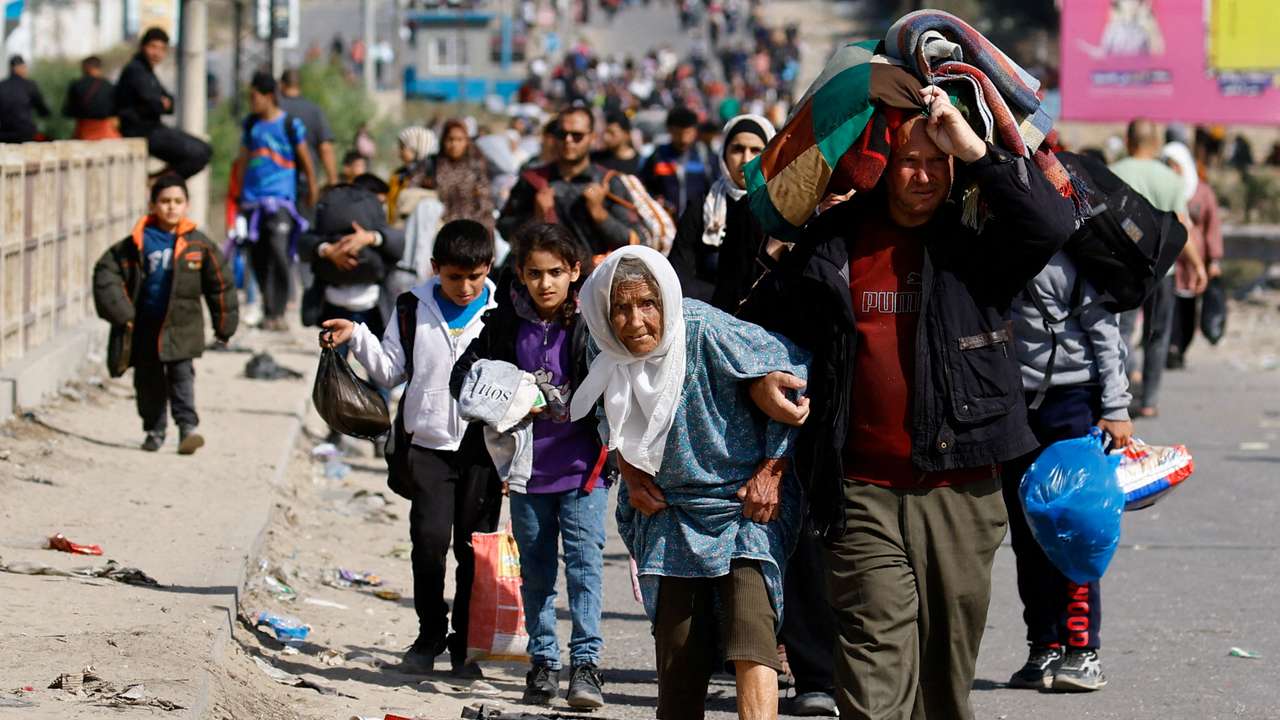 Palestinians fleeing north Gaza move southward, in the central Gaza Strip