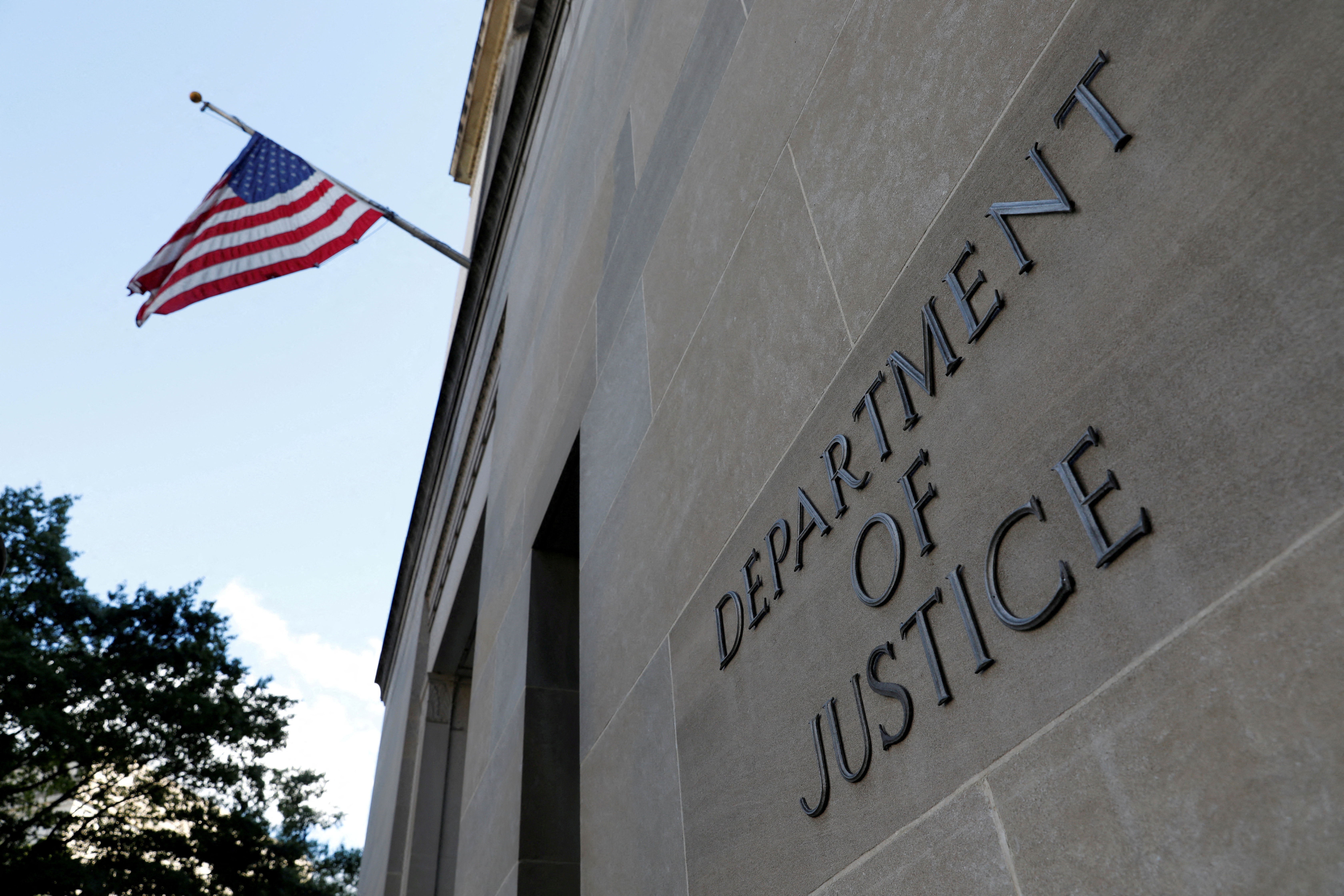 FILE PHOTO: Signage is seen at the United States Department of Justice headquarters in Washington, D.C., U.S., August 29, 2020. REUTERS/Andrew Kelly/