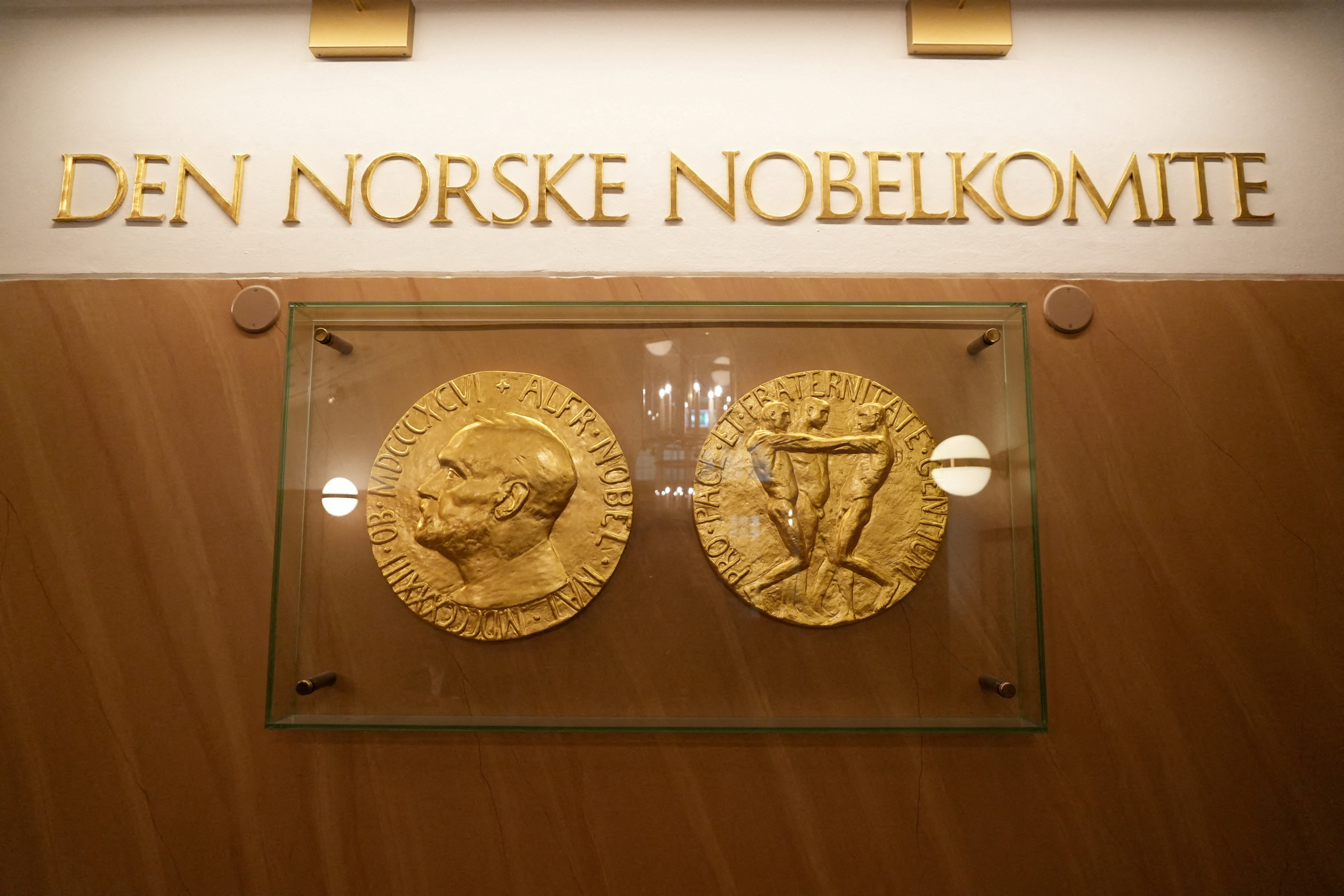 FILE PHOTO: A sign for the Norwegian Nobel Institute is seen on a wall inside the institute's building in Oslo
