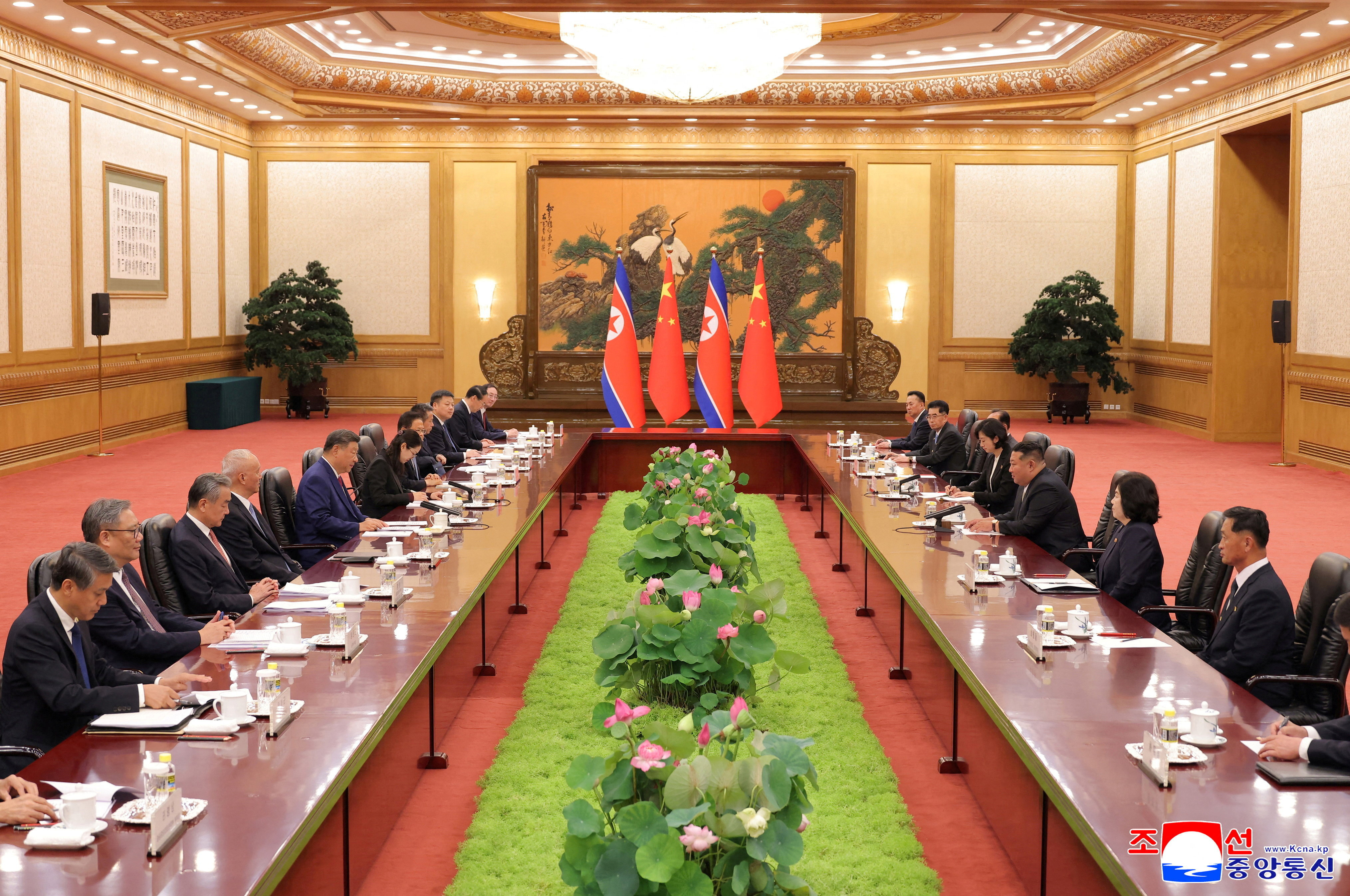 North Korean leader Kim Jong Un and Chinese President Xi Jinping meet in Beijing