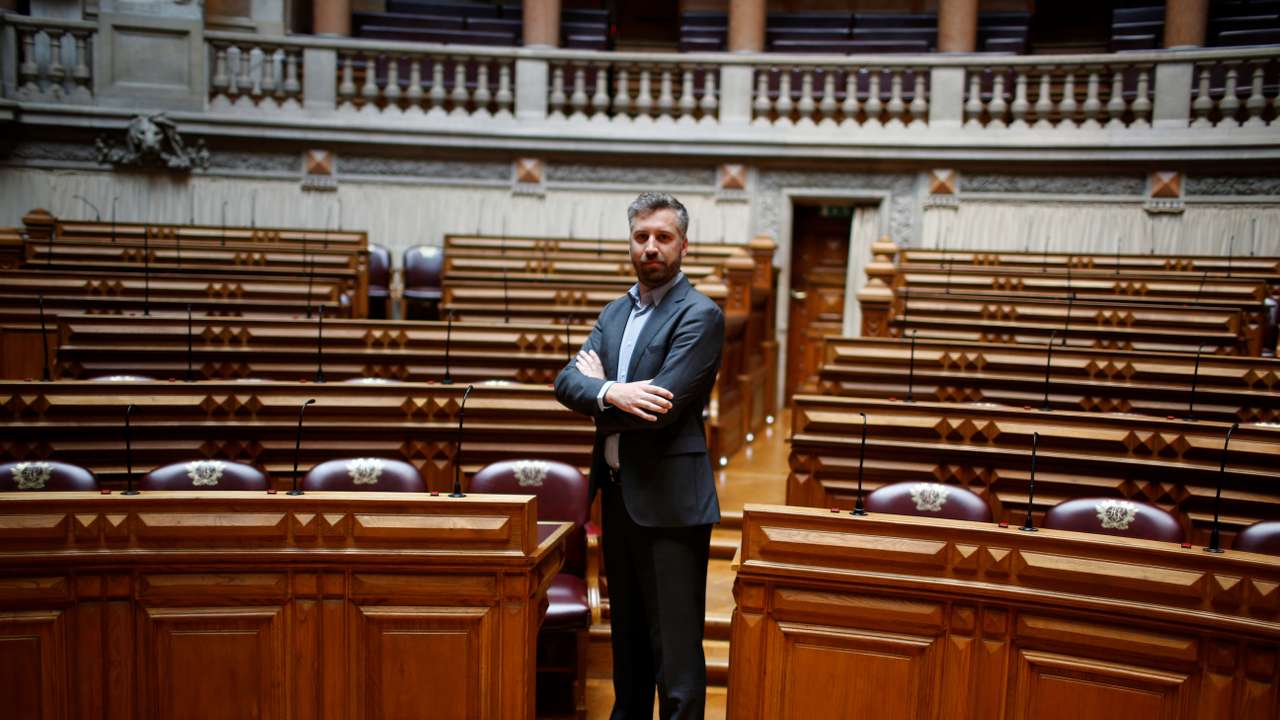 Pedro Nuno Santos poses for a portrait between the legislators of Socialist party and left bloc inside Portuguese parliament in Lisbon