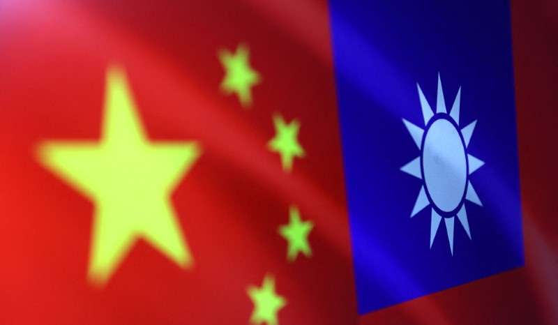 FILE PHOTO: Illustration shows Chinese and Taiwanese flags