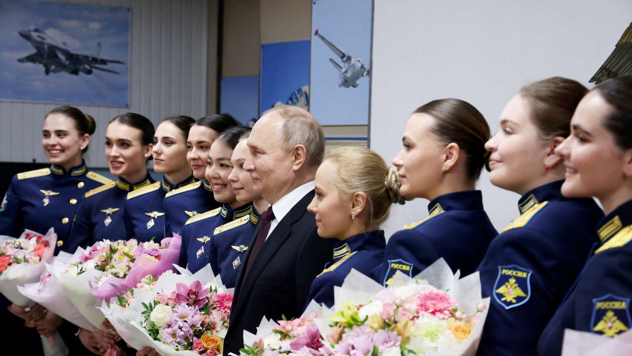 Russian President Putin visits a military aviation school in Krasnodar