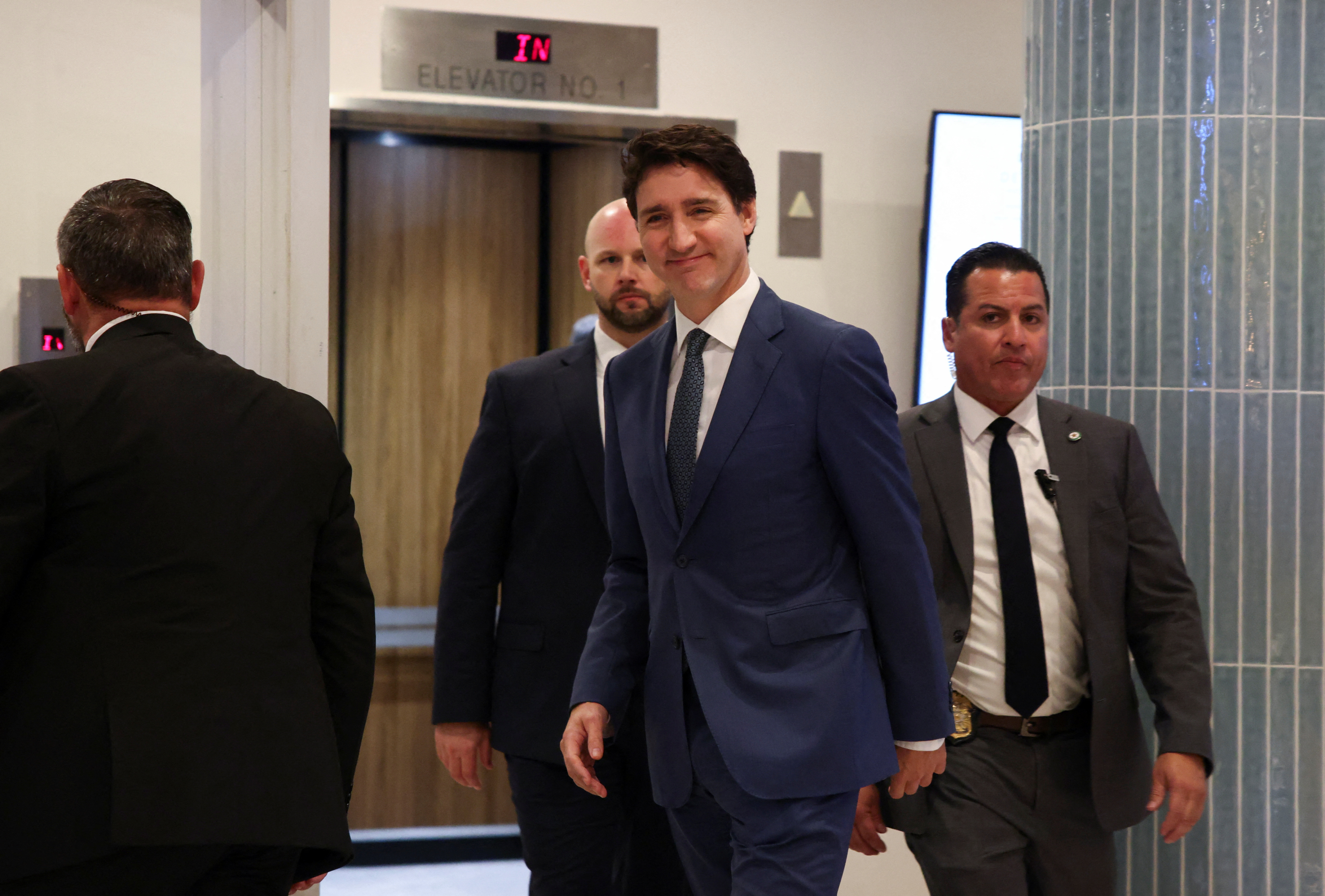 Canada's Prime Minister Justin Trudeau leaves a hotel to meet U.S. President-elect Donald Trump at Mar-a-Lago in Palm Beach