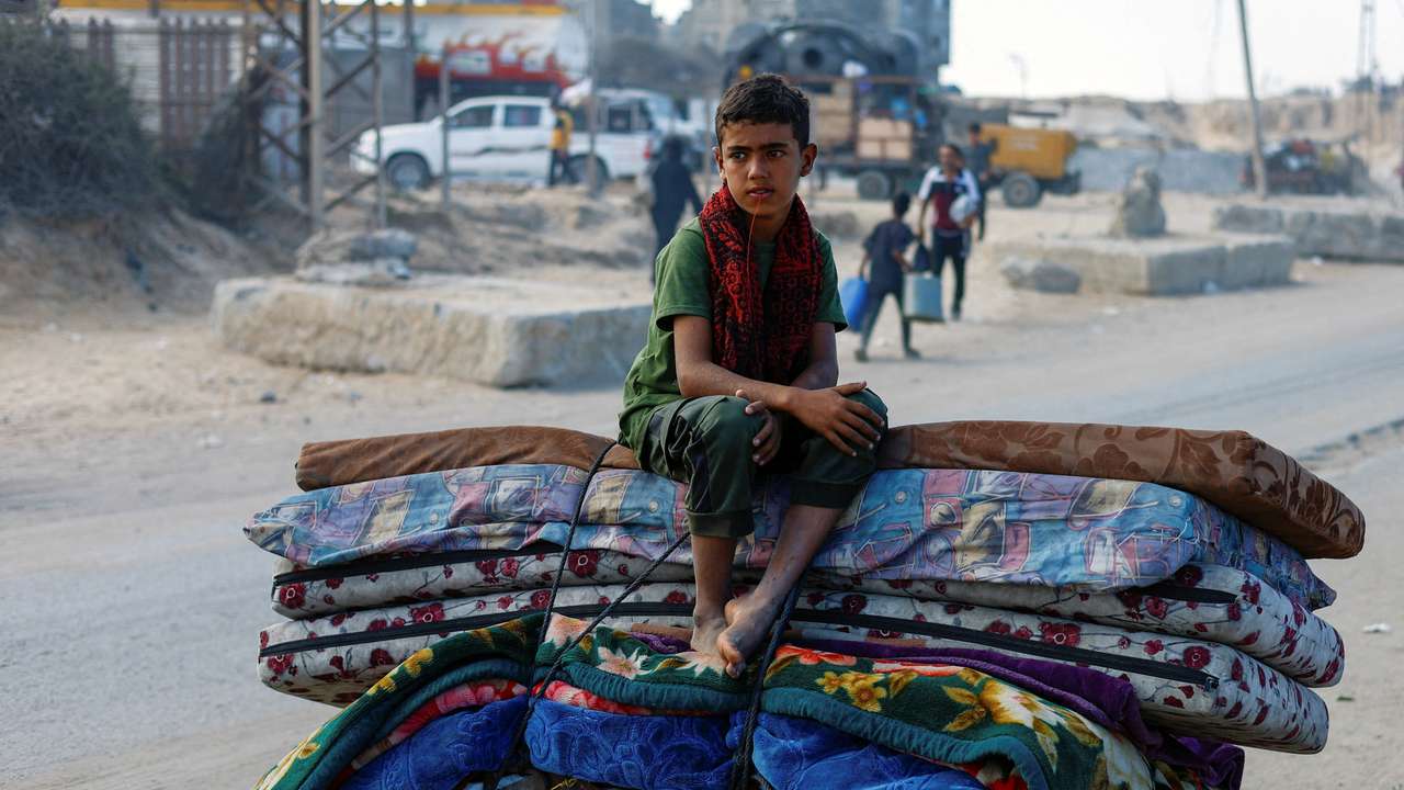 Displaced Palestinians move southward after Israeli forces ordered residents of Gaza City to evacuate to the south