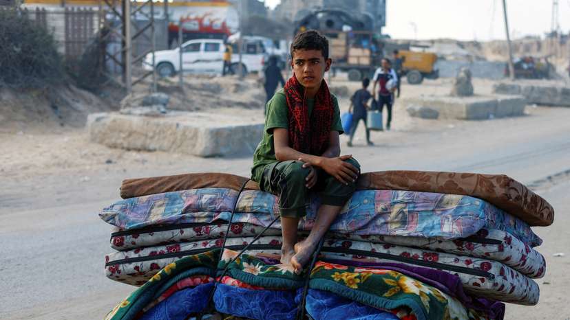 Displaced Palestinians move southward after Israeli forces ordered residents of Gaza City to evacuate to the south