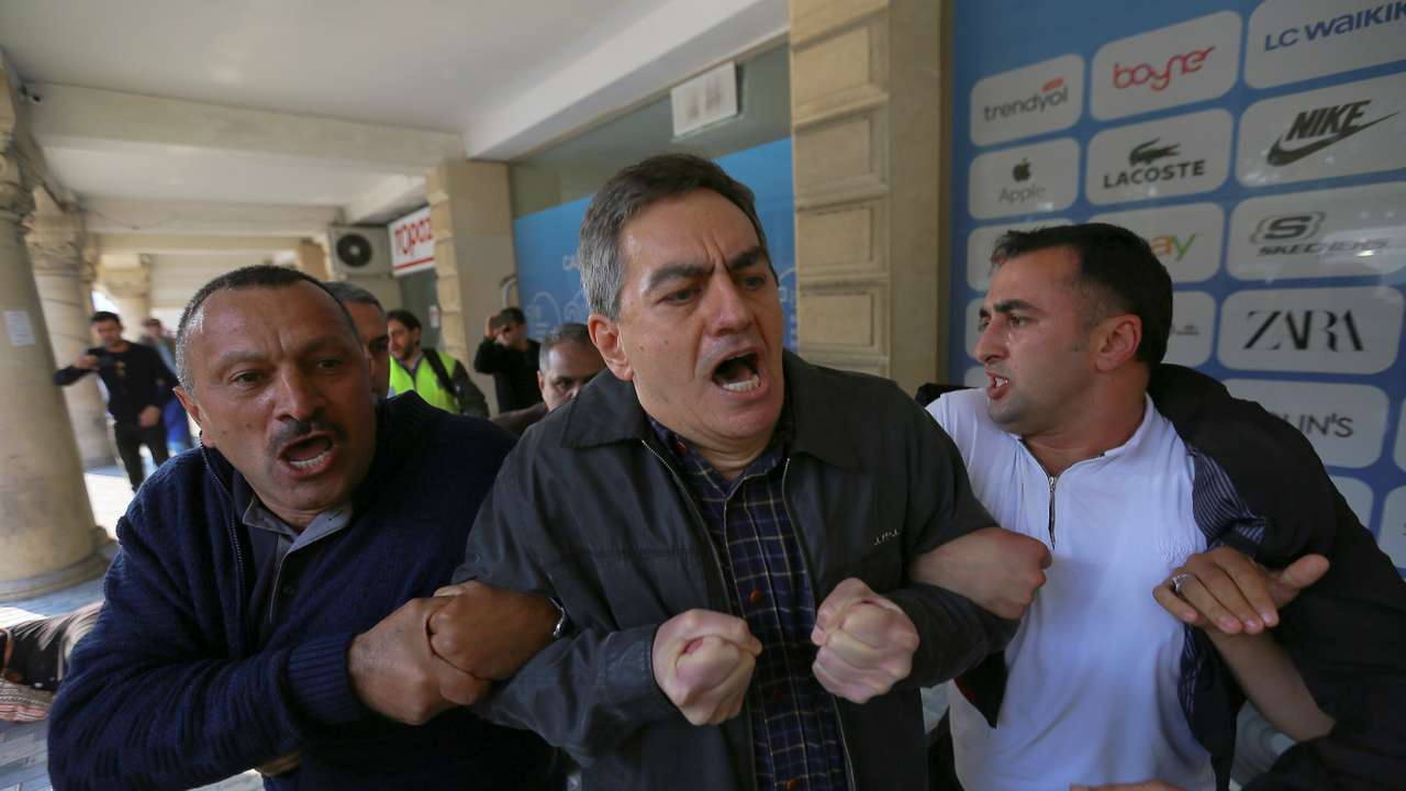 Opposition supporters hold a rally in Baku