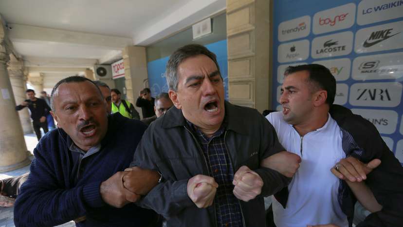 Opposition supporters hold a rally in Baku