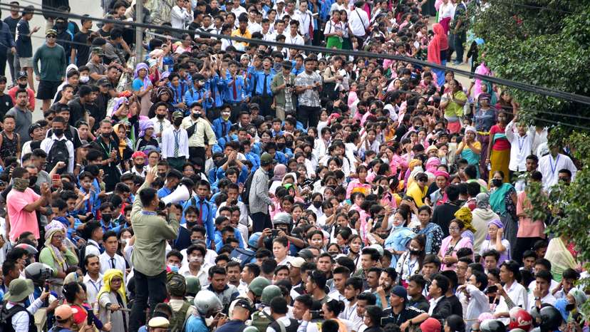 FILE PHOTO: Demonstrators attend a protest march to demand an end to the latest spurt of ethnic violence, in Imphal