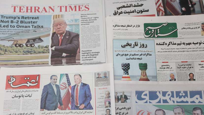 An Iranian newspaper with a cover photo of Iran's Foreign Minister Abbas Araqchi and U.S. Middle East envoy Steve Witkoff, is seen in Tehran