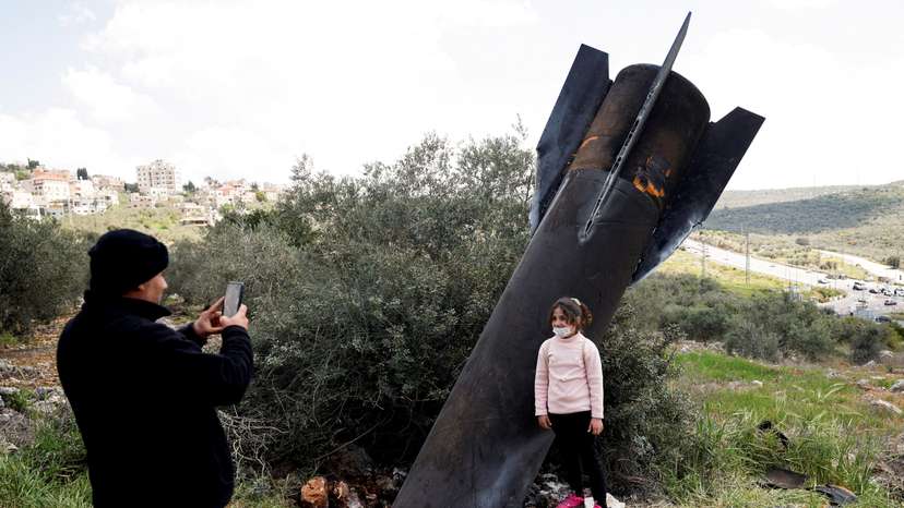 FILE PHOTO: Remnants of a missile stuck in the ground found in Kifl Haris village, near Nablus in the Israeli-occupied West Bank