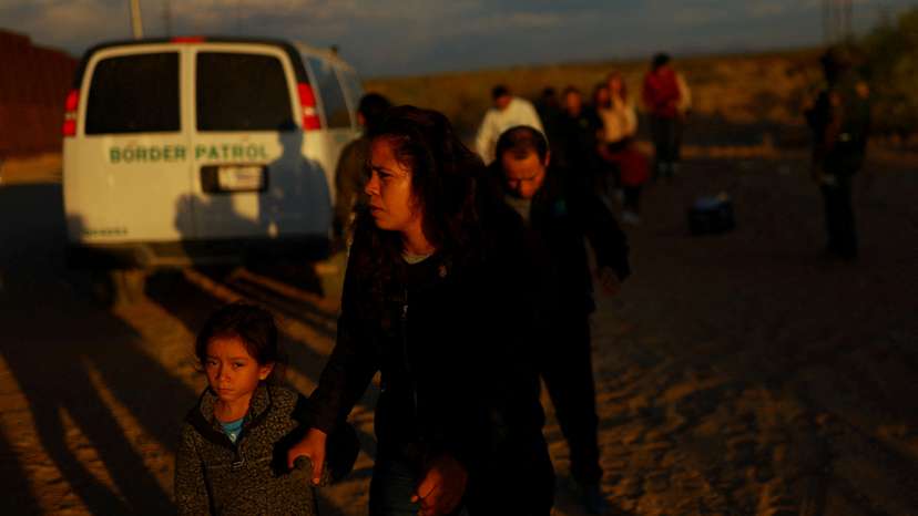 FILE PHOTO: Migrants are detained by U.S. Border Patrol agents in New Mexico