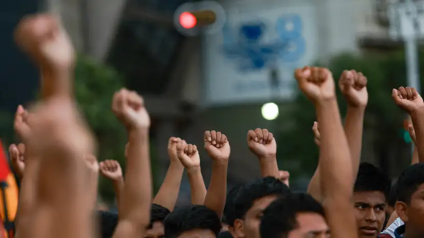 Demonstrators march to demand justice for the disappearance of students of Ayotzinapa Rural Teachers' College, in Mexico City