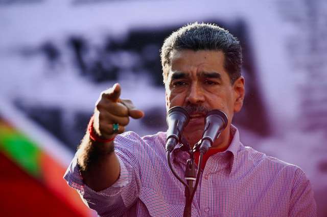 FILE PHOTO: Venezuelan President Nicolas Maduro addresses supporters during an event in Caracas, Venezuela February 27, 2025. REUTERS/Maxwell Briceno/File Photo