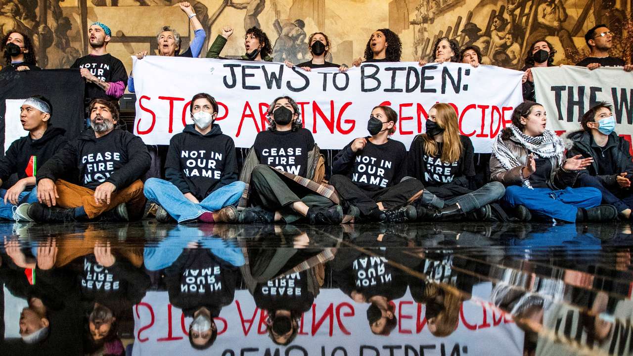 Protesters ask for a ceasefire in the ongoing conflict between Israel and the Palestinian Islamist group Hamas, as U.S. President Biden attends an interview in New York