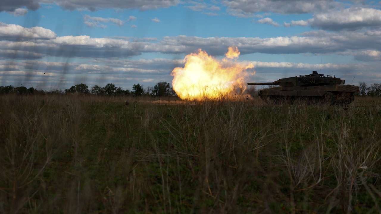 Ukrainian servicemen fire a Leopard 2A6 tank during a military exercise in Donetsk region