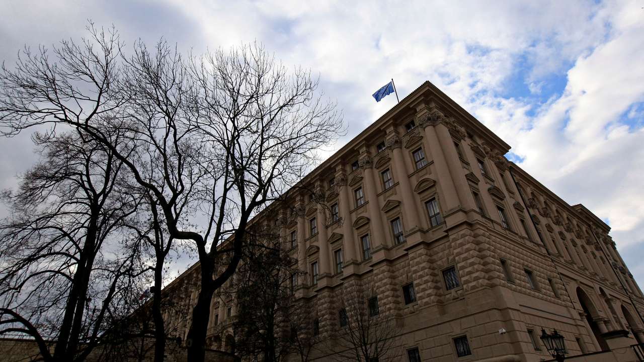 FILE PHOTO: An European Union flag flutters on the Czech Foreign Ministry headquarters before an extraordinary Visegrad Group summit in Prague