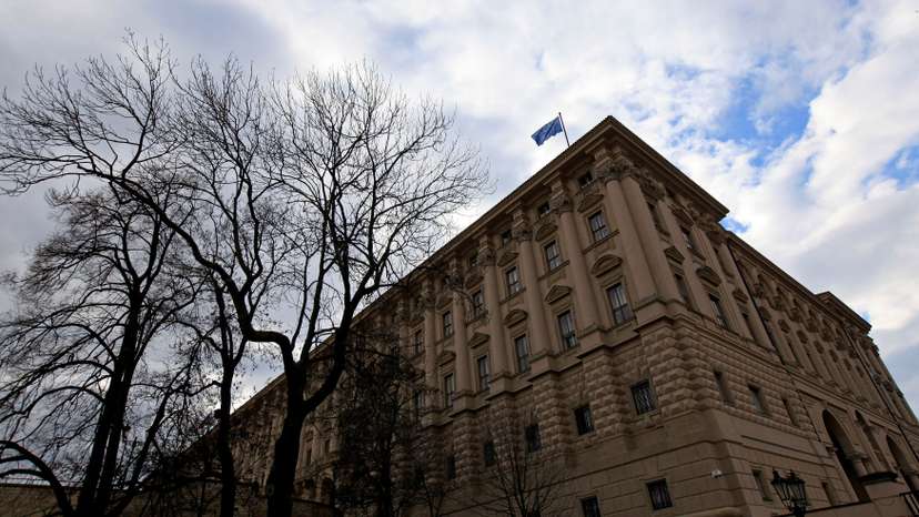 FILE PHOTO: An European Union flag flutters on the Czech Foreign Ministry headquarters before an extraordinary Visegrad Group summit in Prague