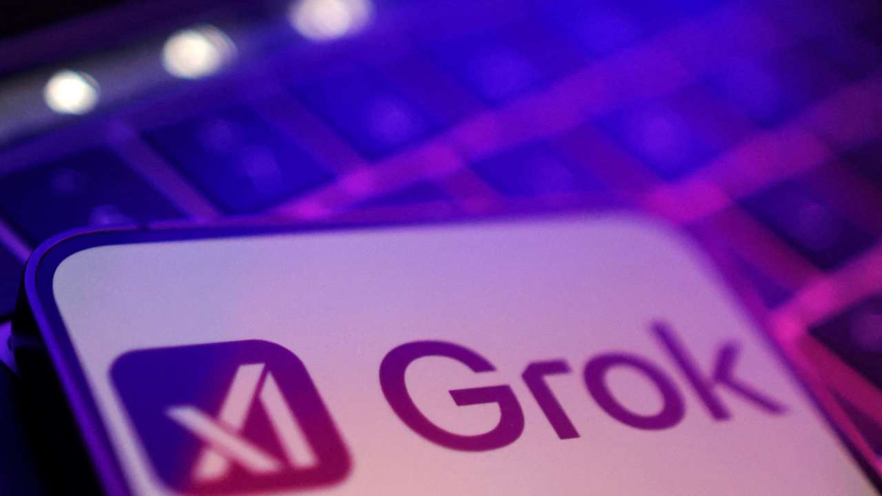 FILE PHOTO: Illustration shows xAI and Grok logos